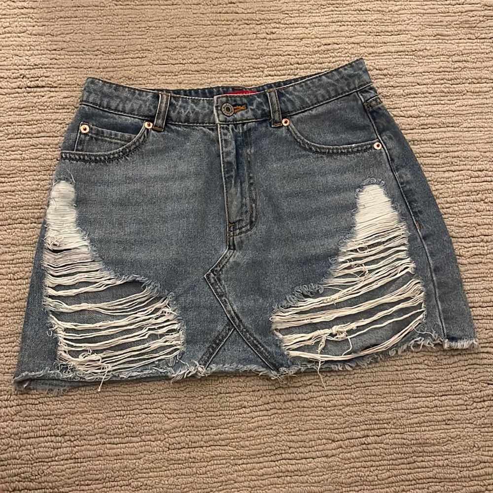 Distressed denim skirt
